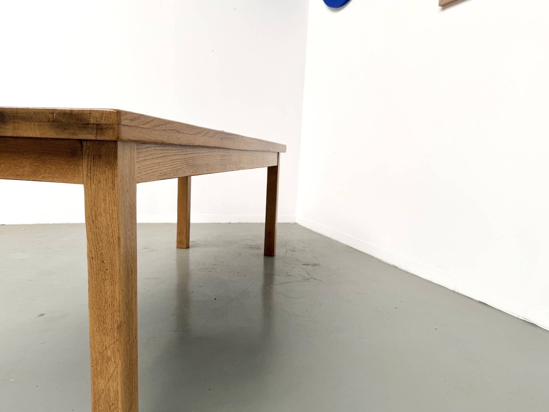 Solid oak farmhouse table, square legs.