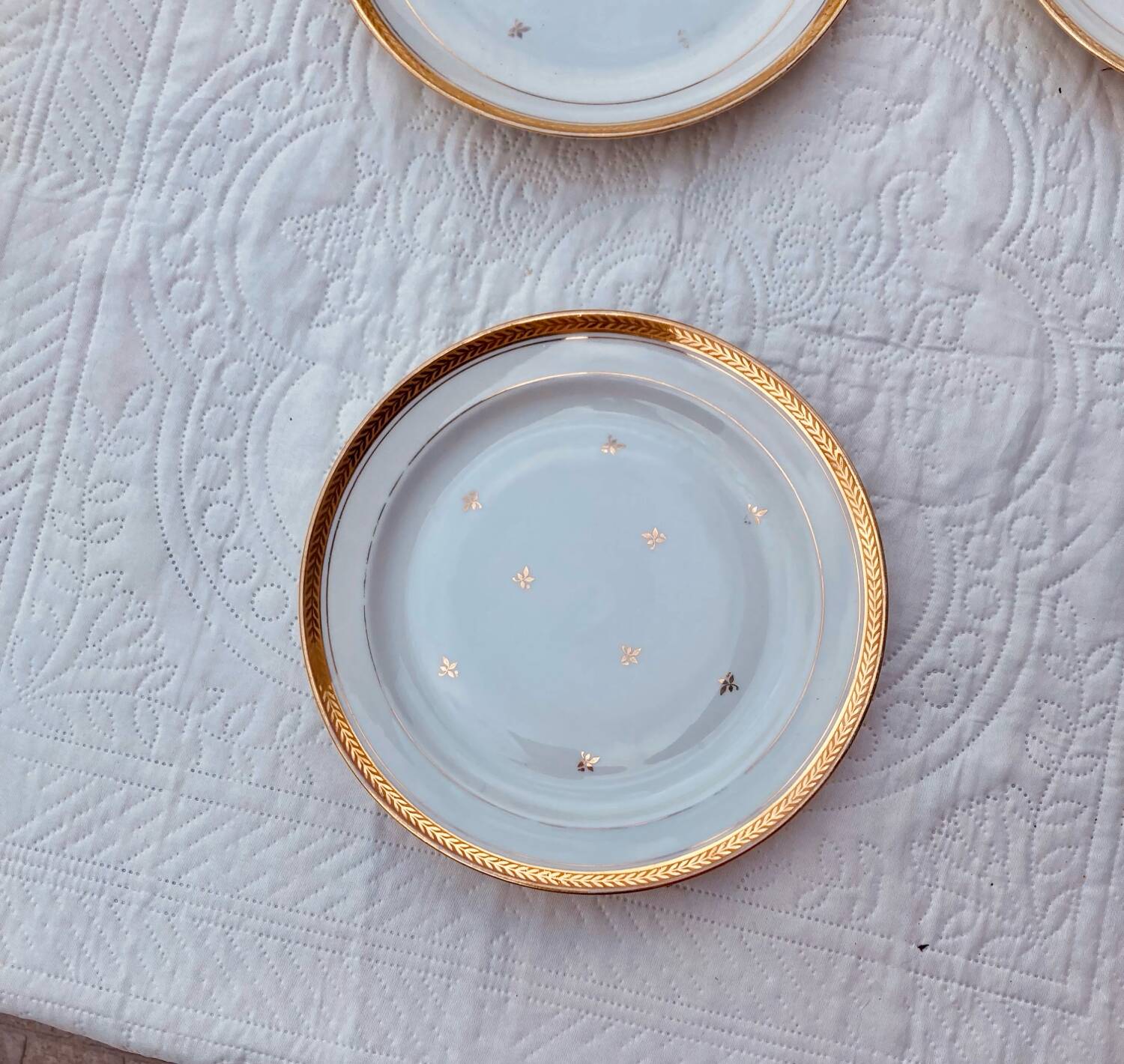 Set of golden Limoges plates