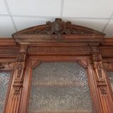 Glass-fronted walnut bookcase