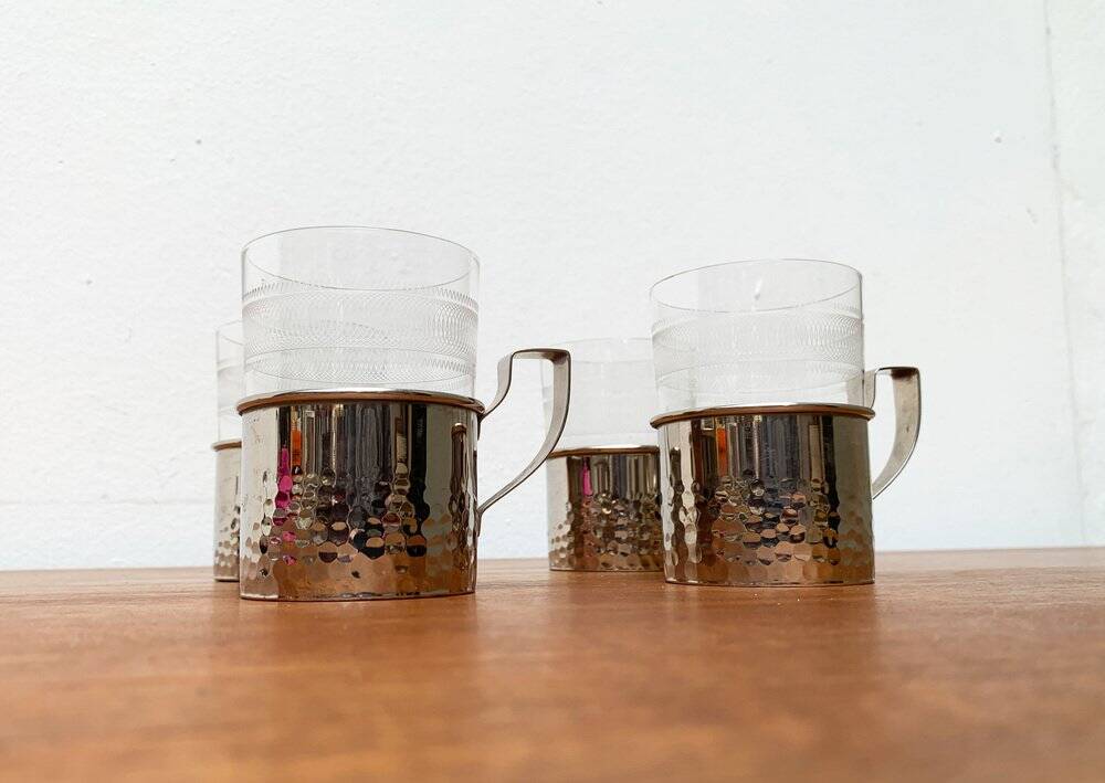 Vintage tea glasses RDA from East Germany by MUQ, Metallwarenfabrik Union Quedlinburg, set of 4.