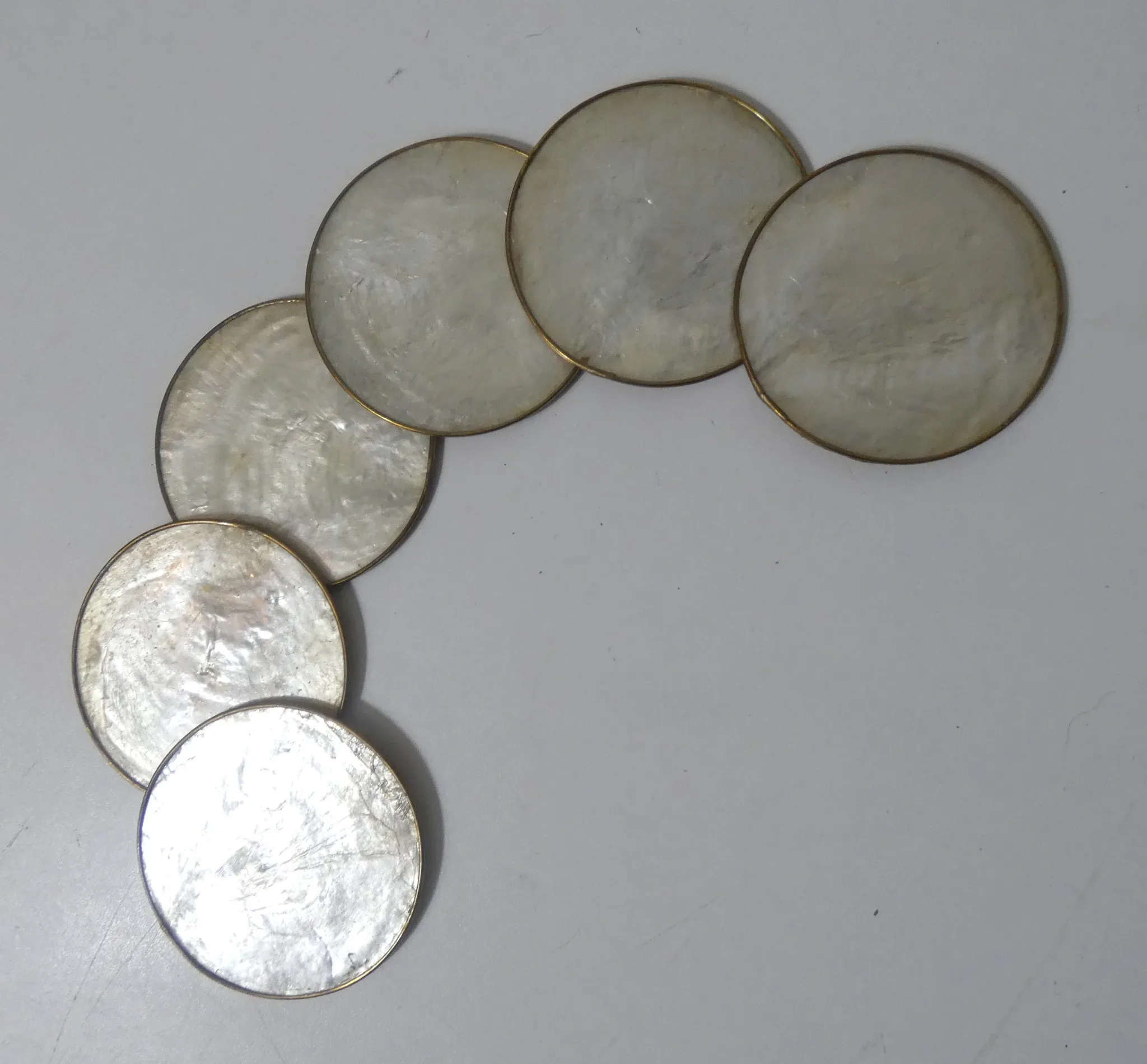 set of 6 vintage mother-of-pearl and brass coasters