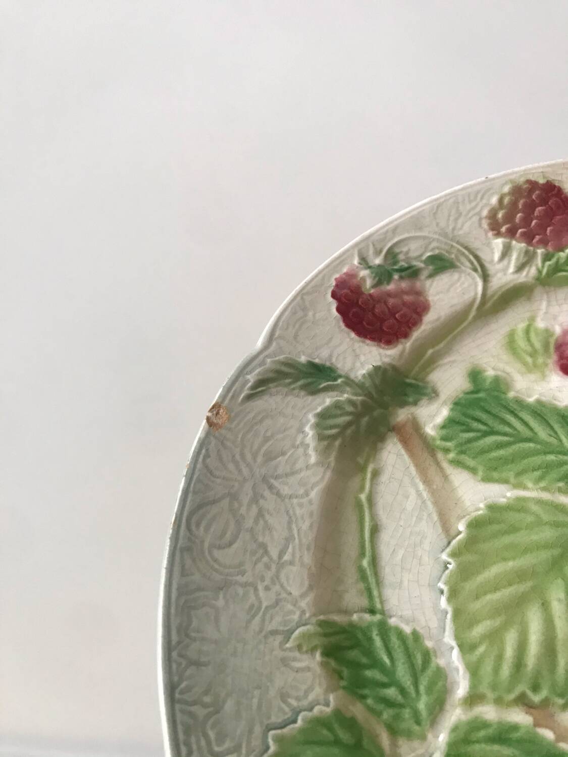 Trio of St Clement dessert plates in 19th century slip