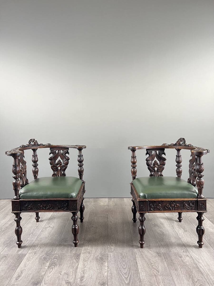 Pair of corner armchairs in carved wood, 19th century