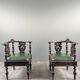 Pair of corner armchairs in carved wood, 19th century