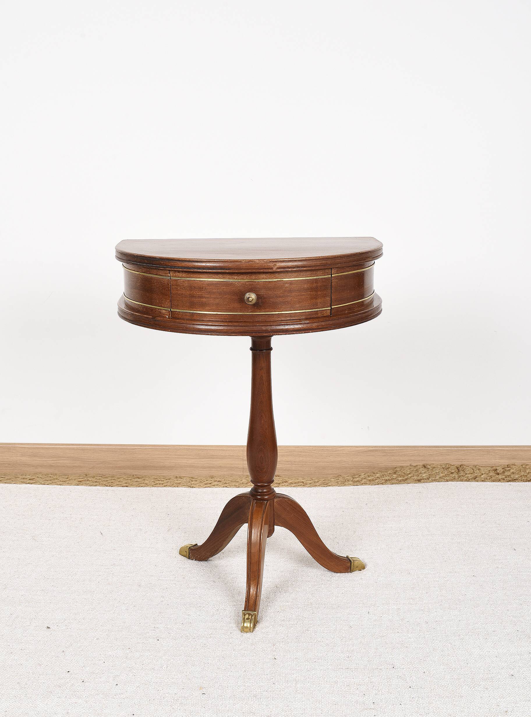 Pedestal table or small side table with drawer.