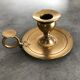 Hand candlestick in massive brasse