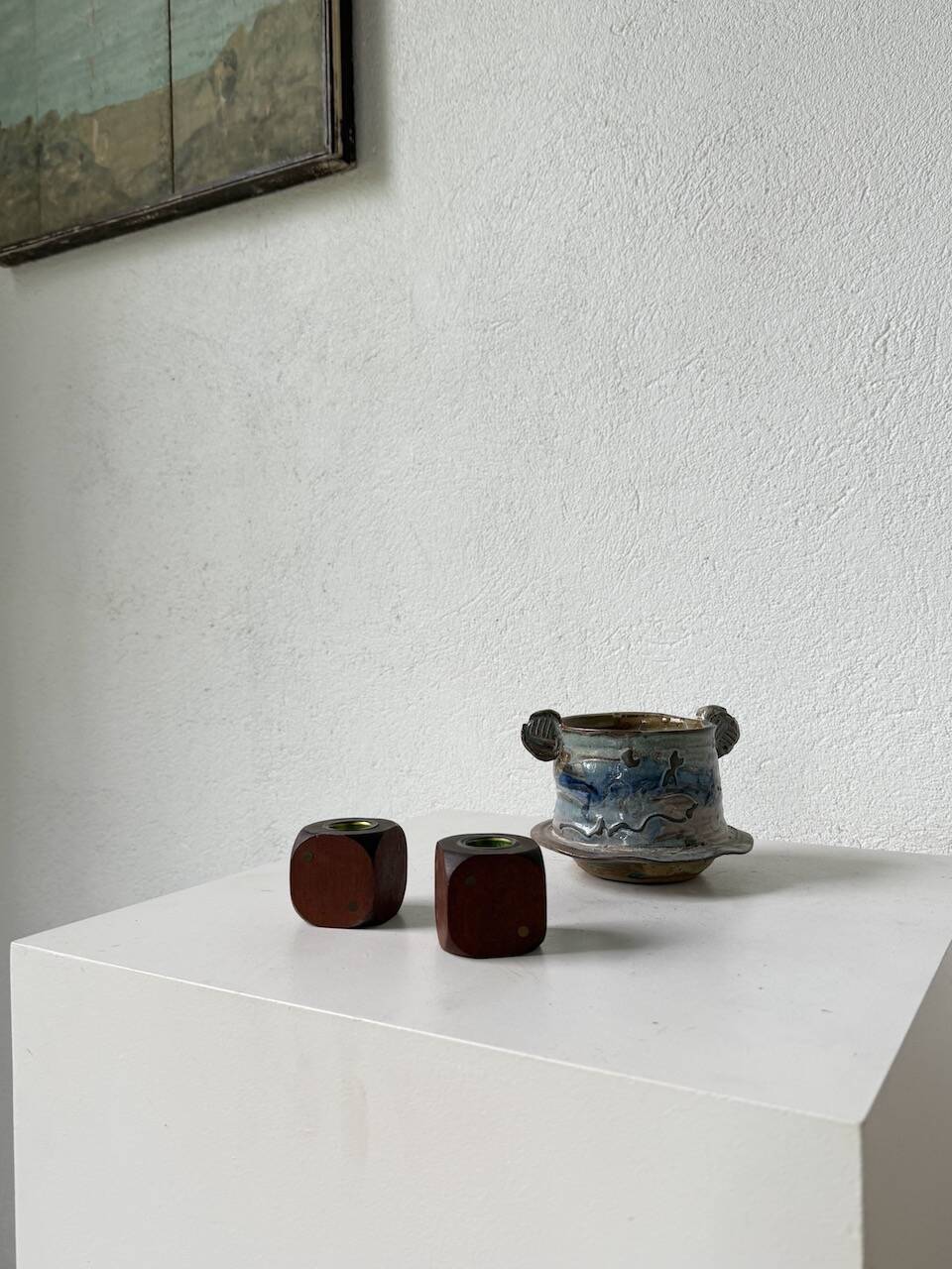 Pair of 1960s teak and brass "dice" candlesticks