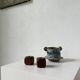 Pair of 1960s teak and brass "dice" candlesticks