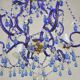 lustre bleu, fait de perles.