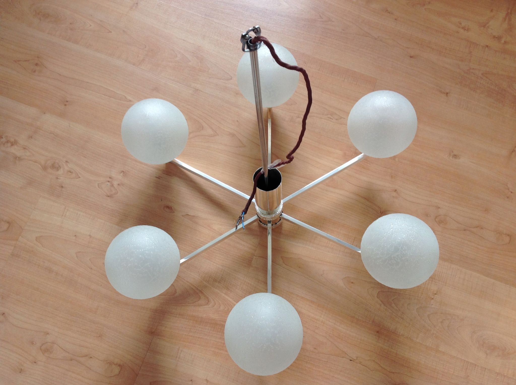 Six-light chrome metal chandelier and opaque glass globes / vintage 60s and 70s