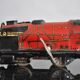 Tin litho brand LR spring-loaded toy locomotive