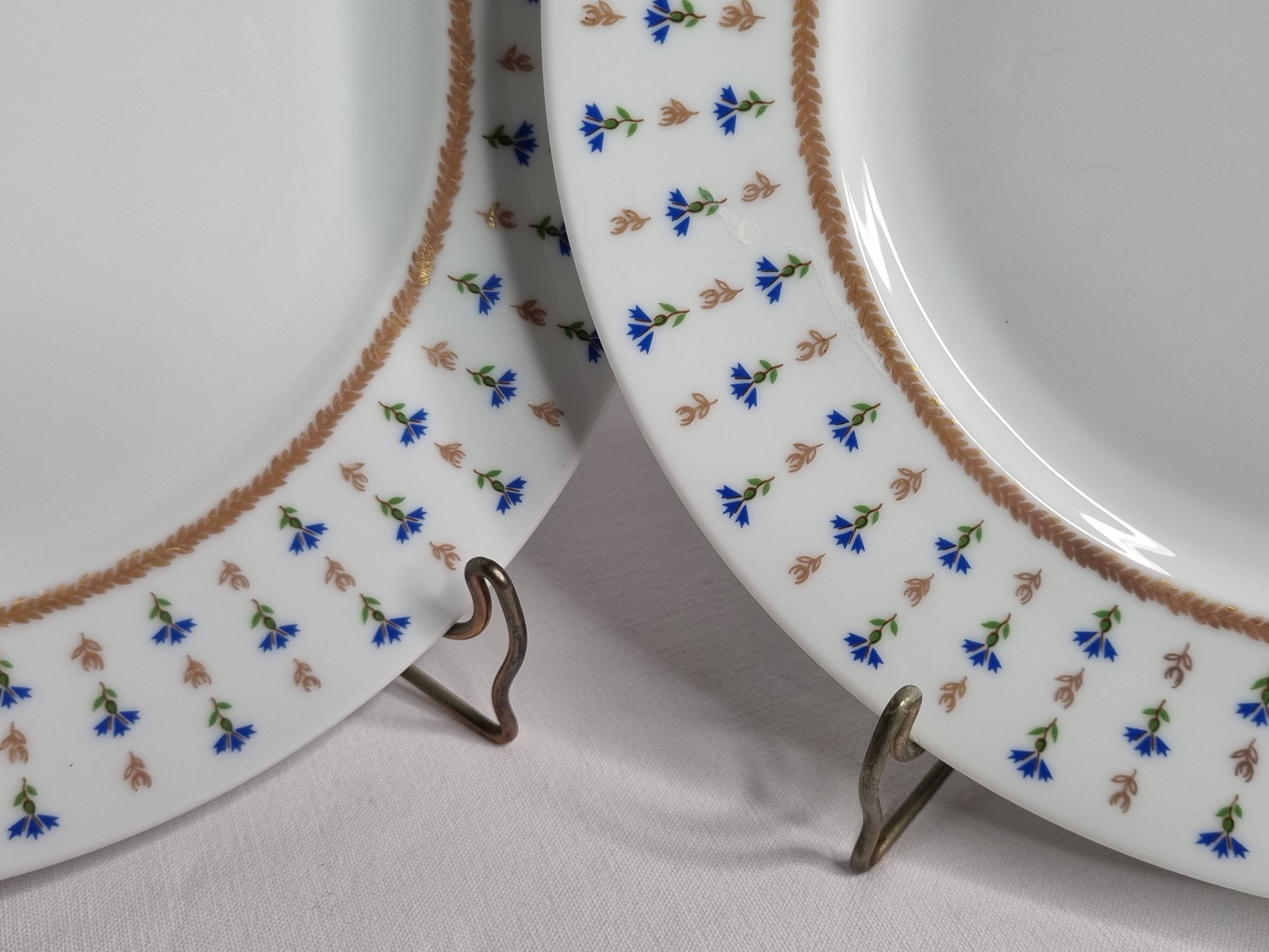 Pair of Limoges Renaud & Cie flat plates, "Vieux Nyon" model, 23.5 cm