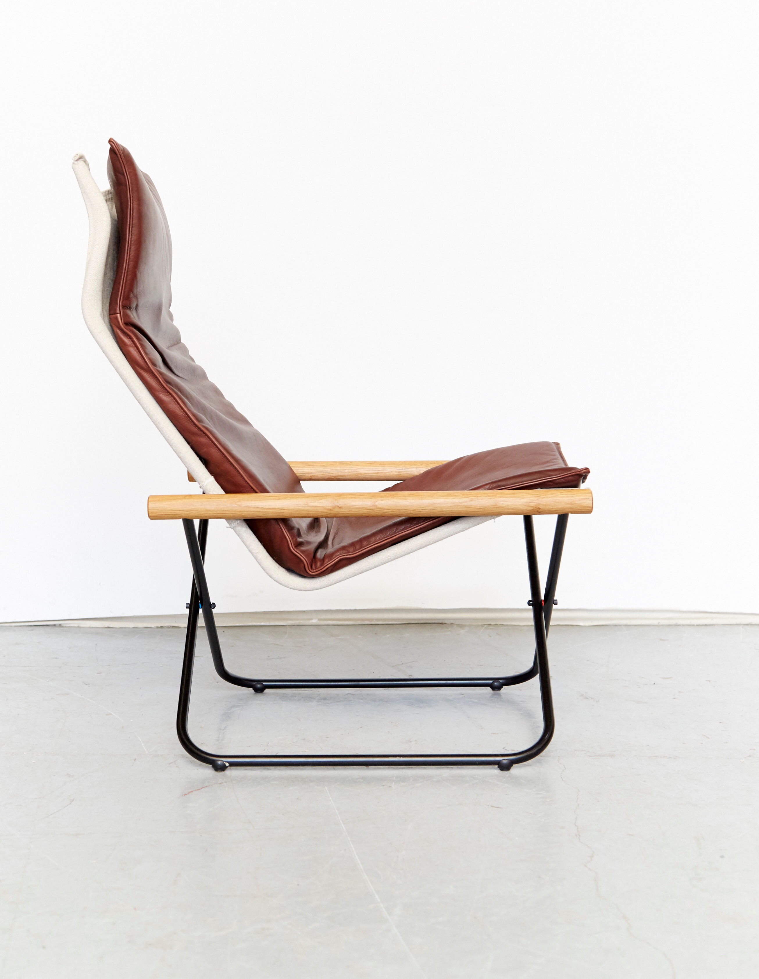 Takeshi Nii folding chair and ottoman "NychairX", 1970