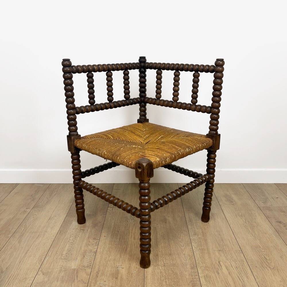 Old wooden ball fireside chair