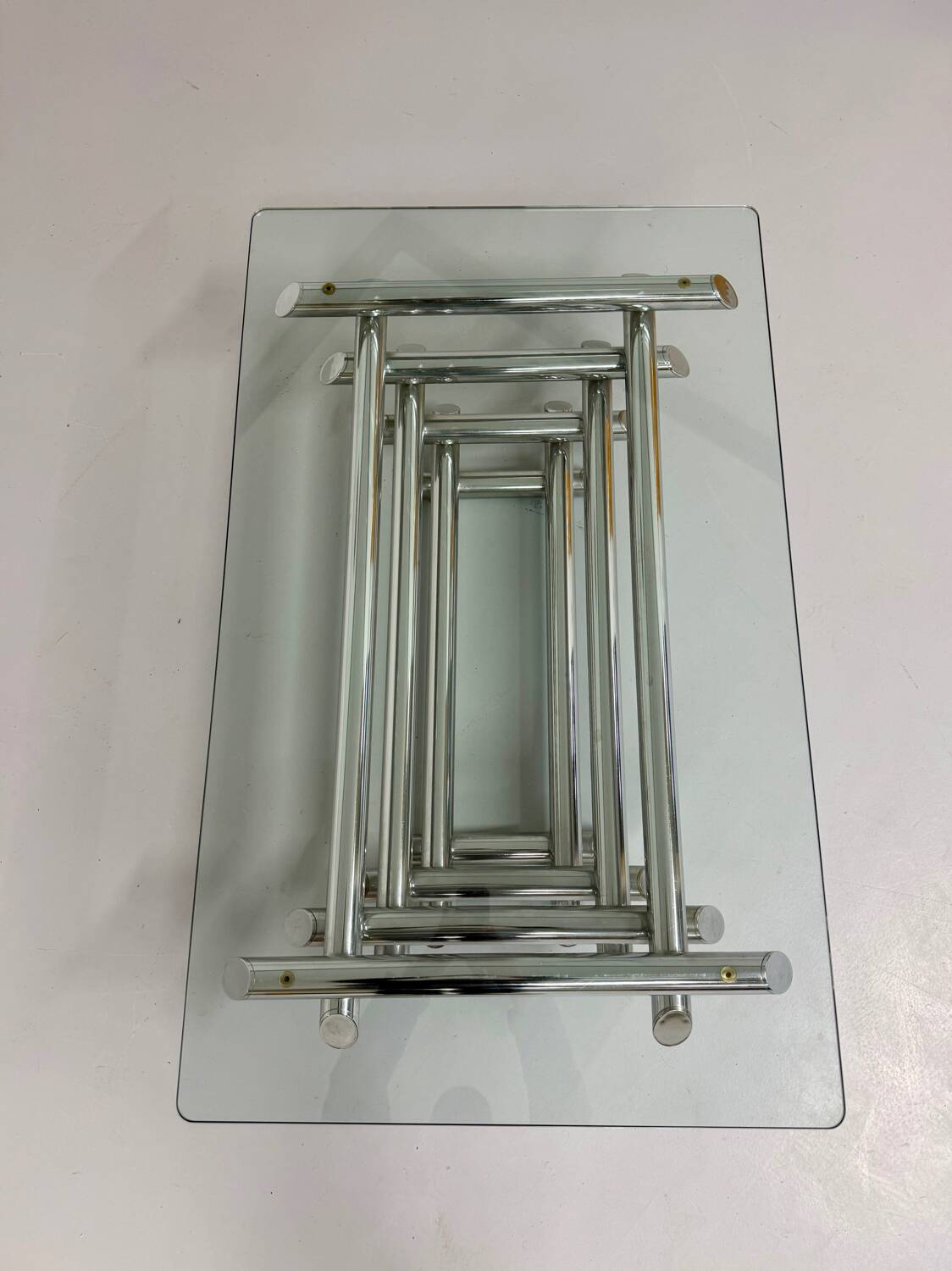 Space coffee table from the 70s, tubular metal and glass, Italian design