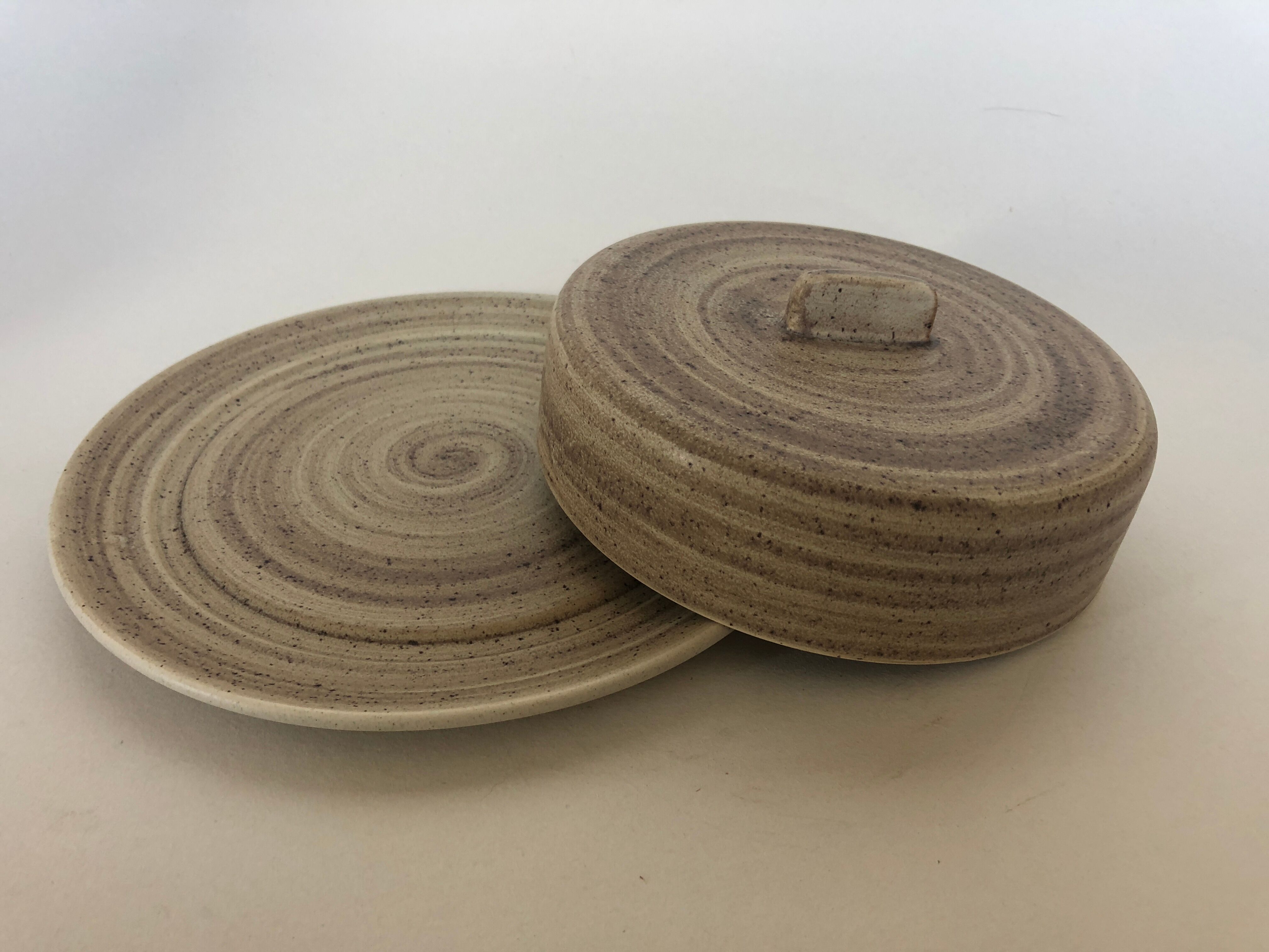Dish with Bell in speckled sandstone
