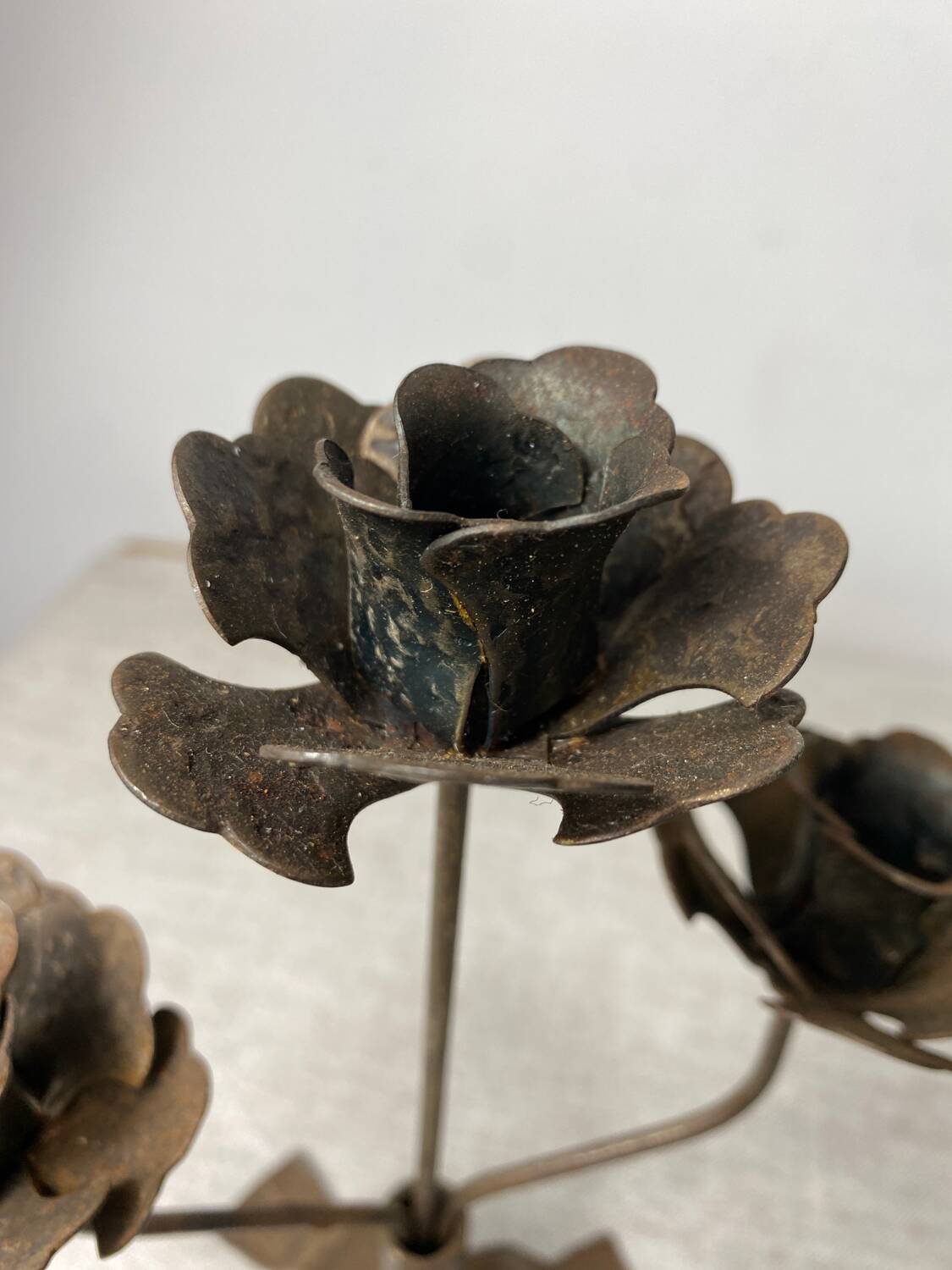 Rose shaped metal candle holder