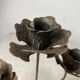 Rose shaped metal candle holder