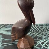 Carved wooden pelican. Dark wood.