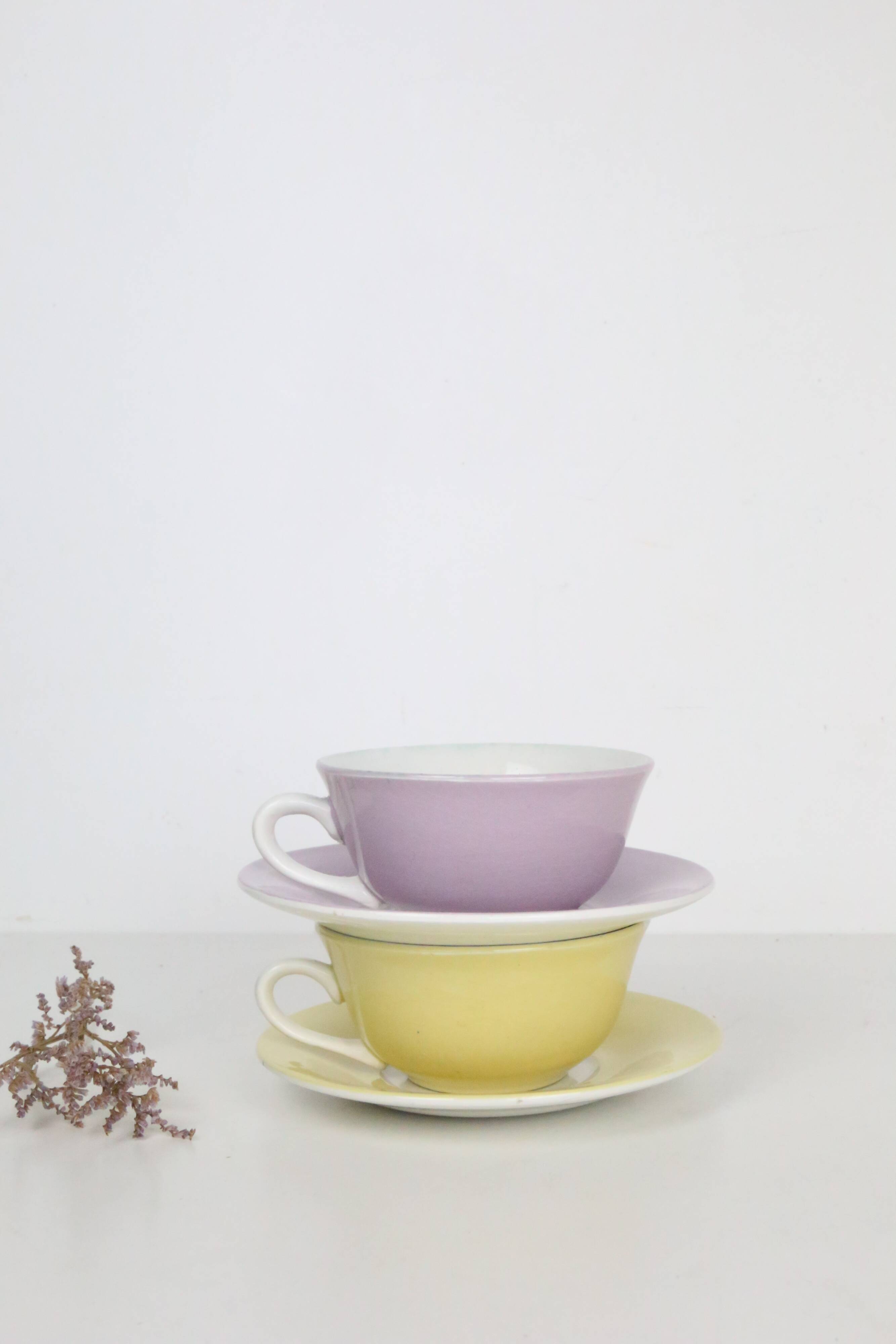 Duo of yellow and purple cups + vintage saucers