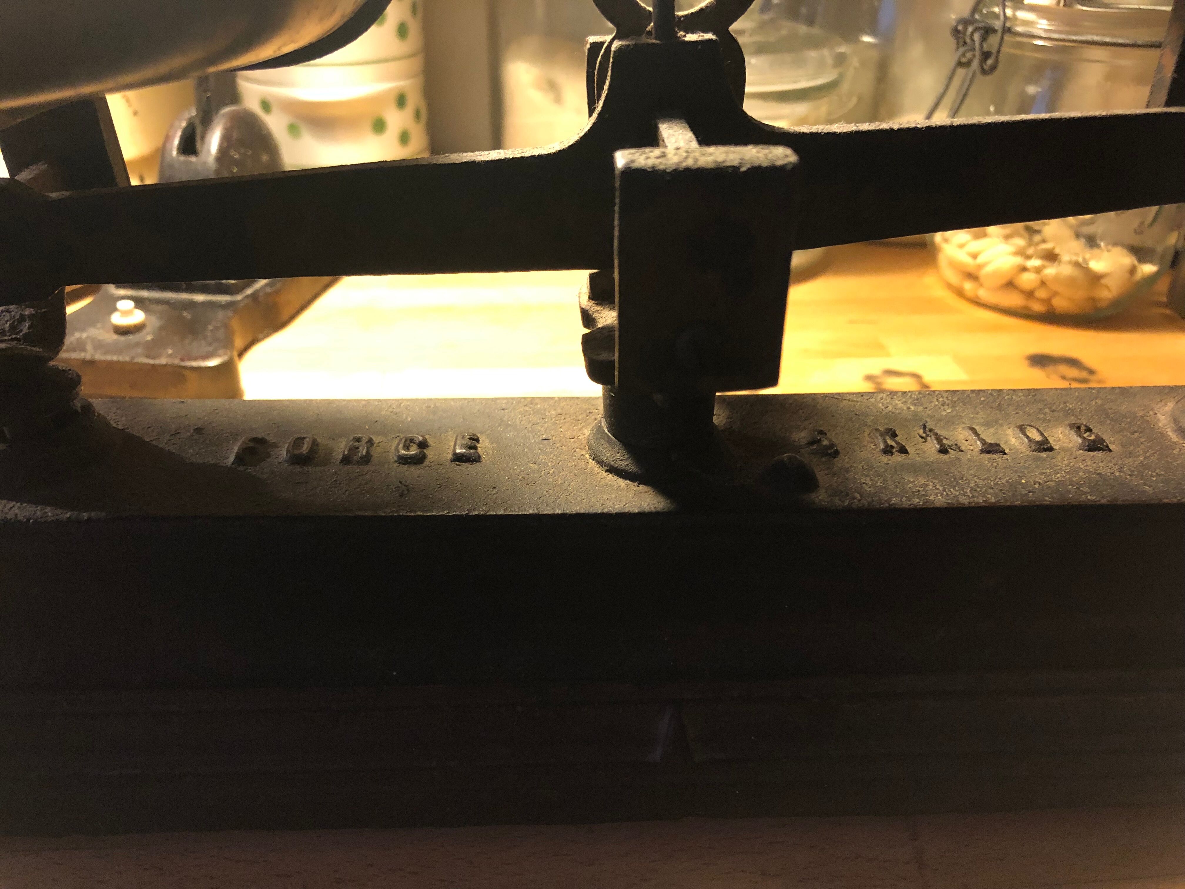 Old cast iron scale with weight
