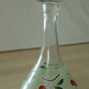 Glass carafe with enamel decoration of cherries.