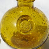 Bottle in bubbled glass of biot