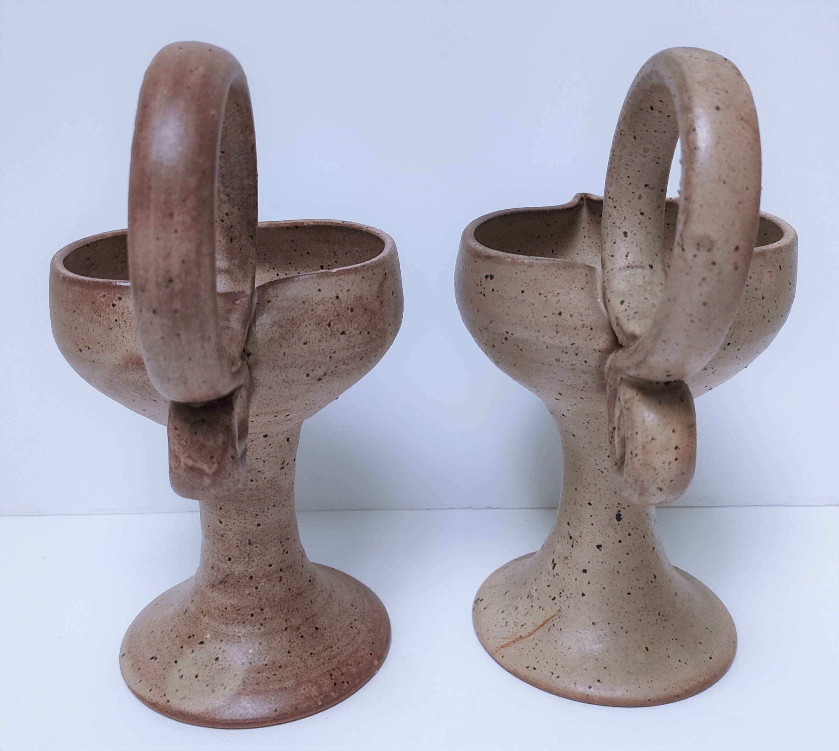 Pair of vintage “heart” sandstone candlesticks
