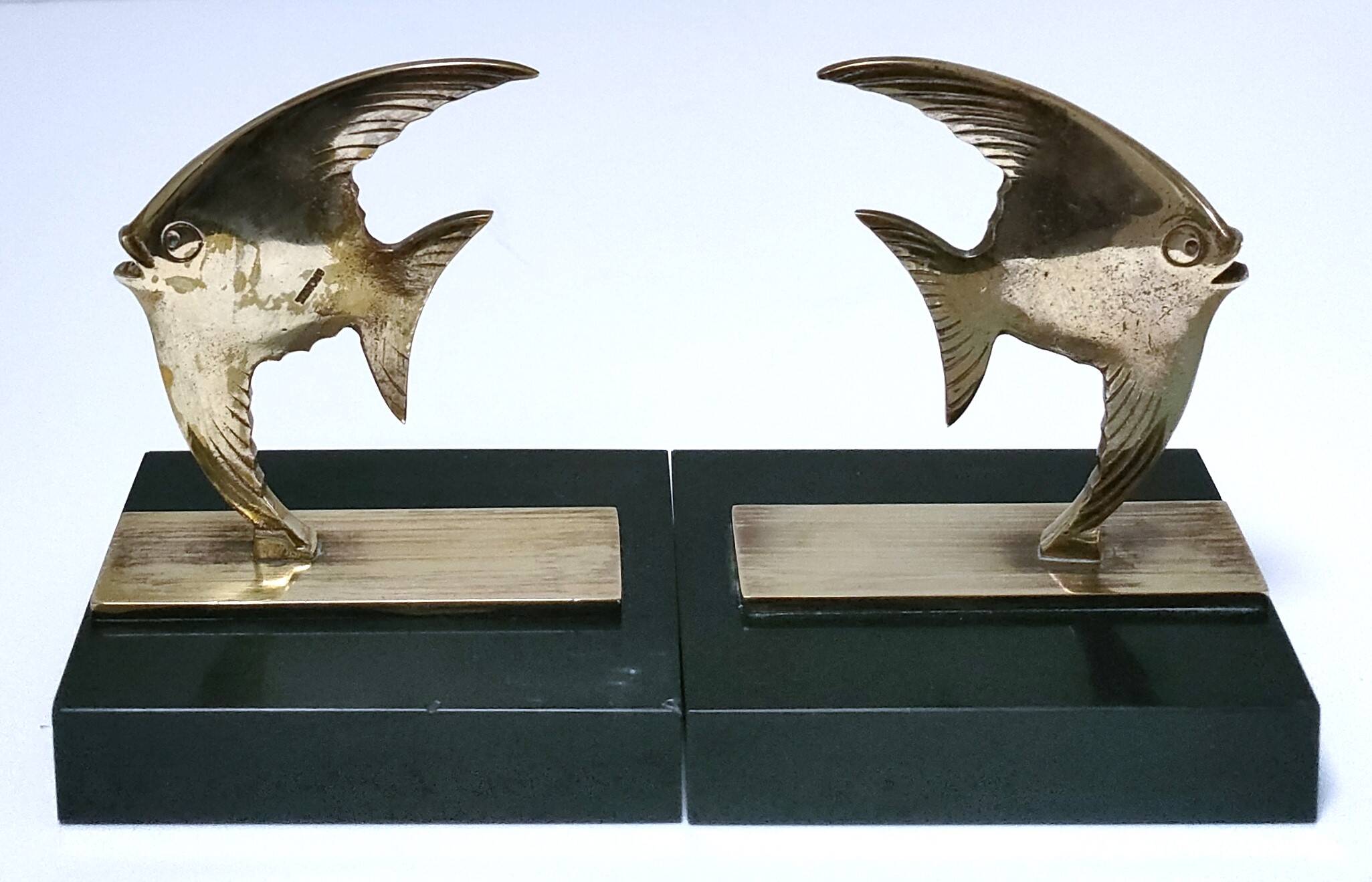 Pair of designer black marble bronze fish bookends