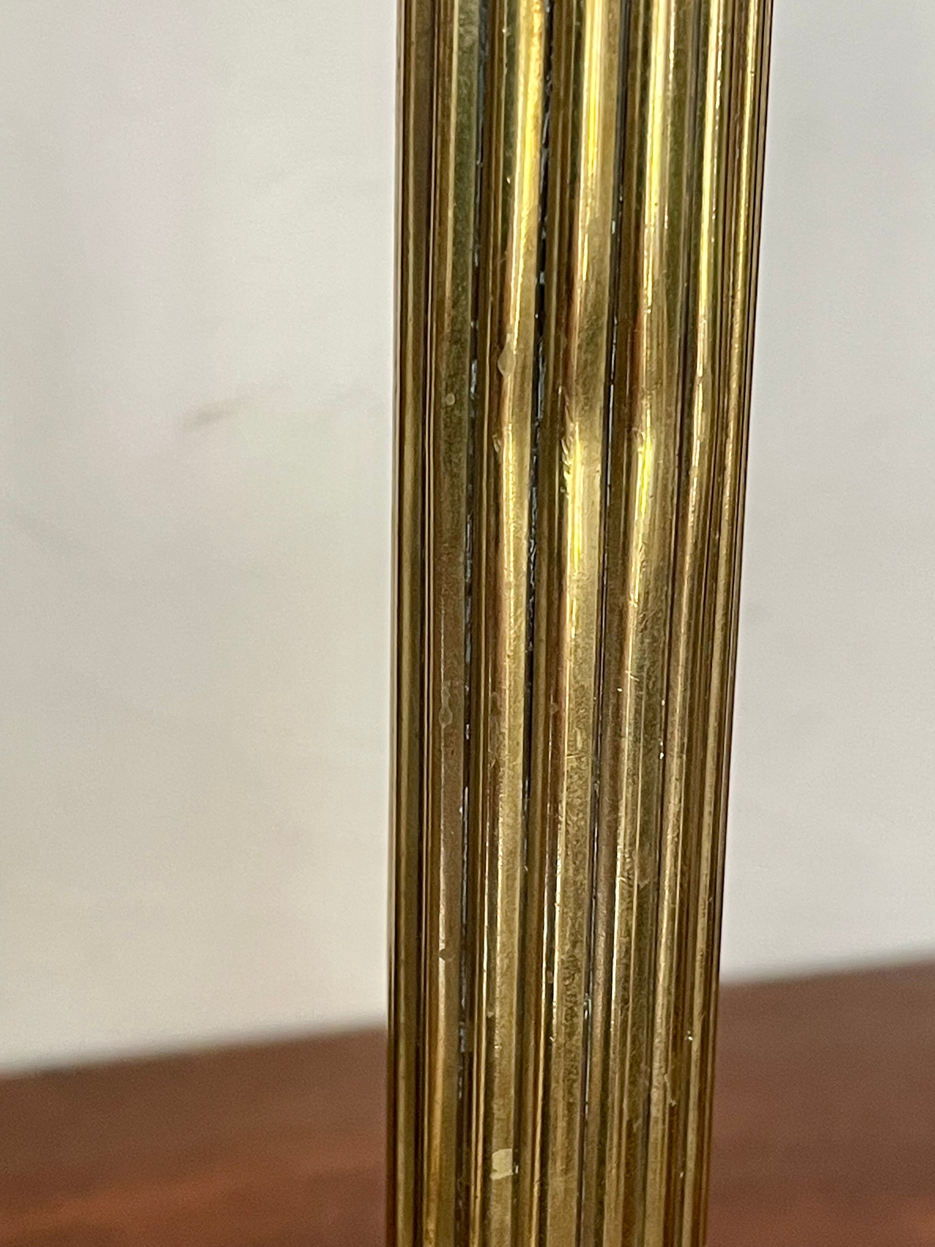 Payroll of brass column candle holders