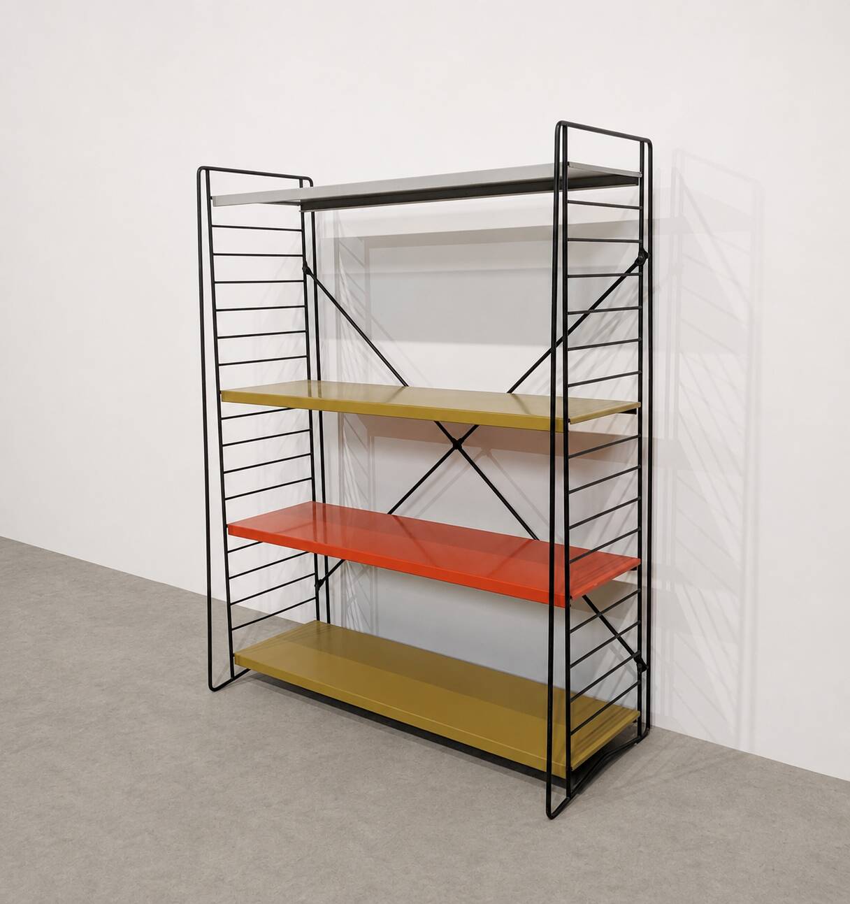 Vintage metal Tomado shelf to place
