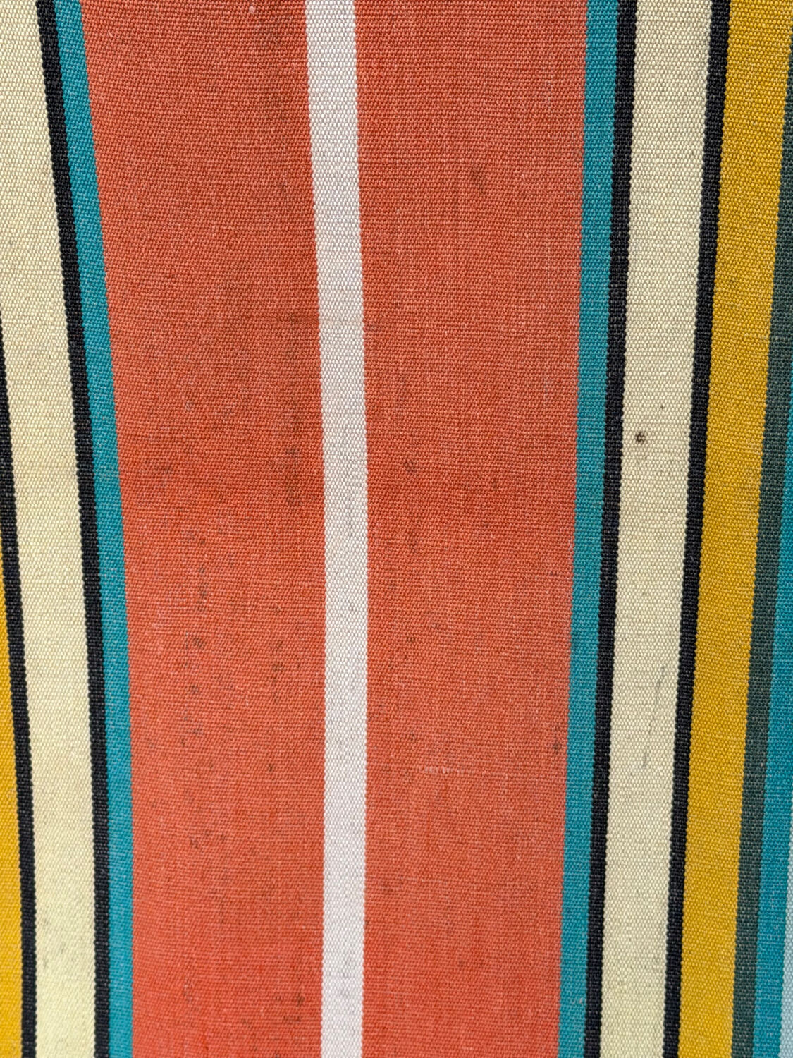 Vintage striped multicoloured deck chair with original patina.