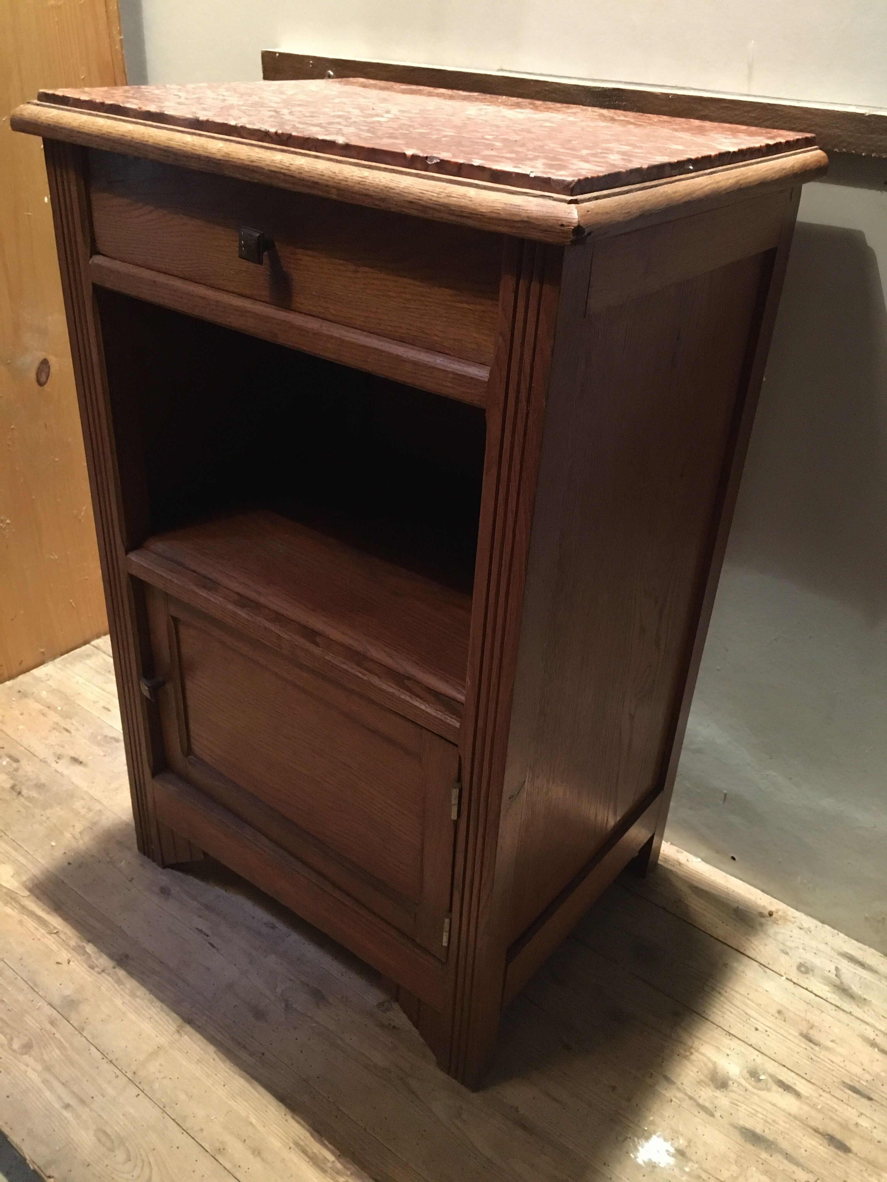 Solid oak bedside table with brown marble.