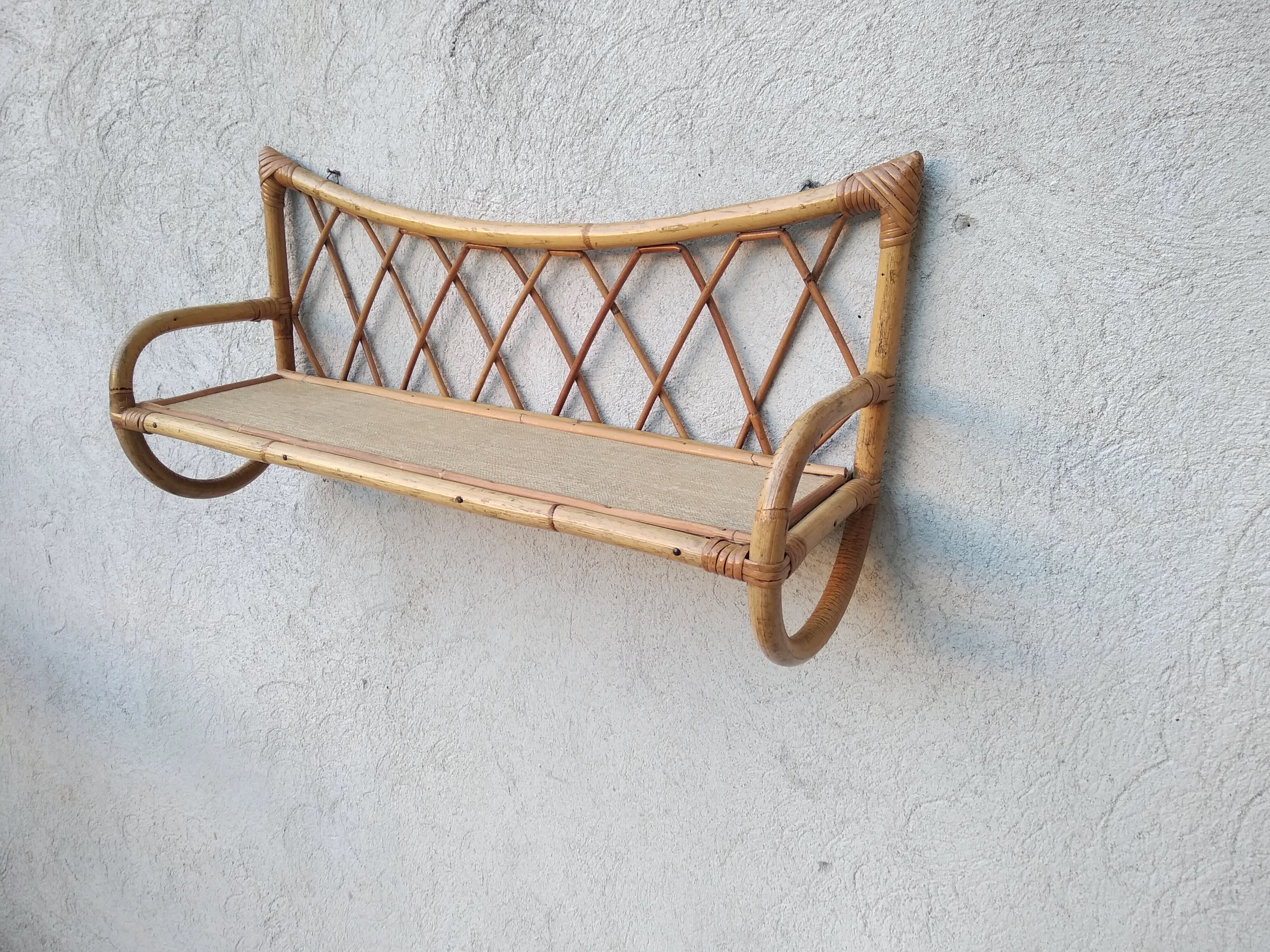 Rattan wall shelf from the 60s