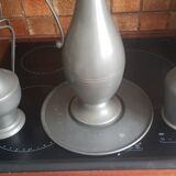 2 pitchers and 1 pewter pitcher