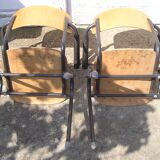 Pair of stackable class armchairs with Bakelite armrests