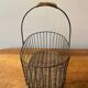 Small wicker and green metal basket