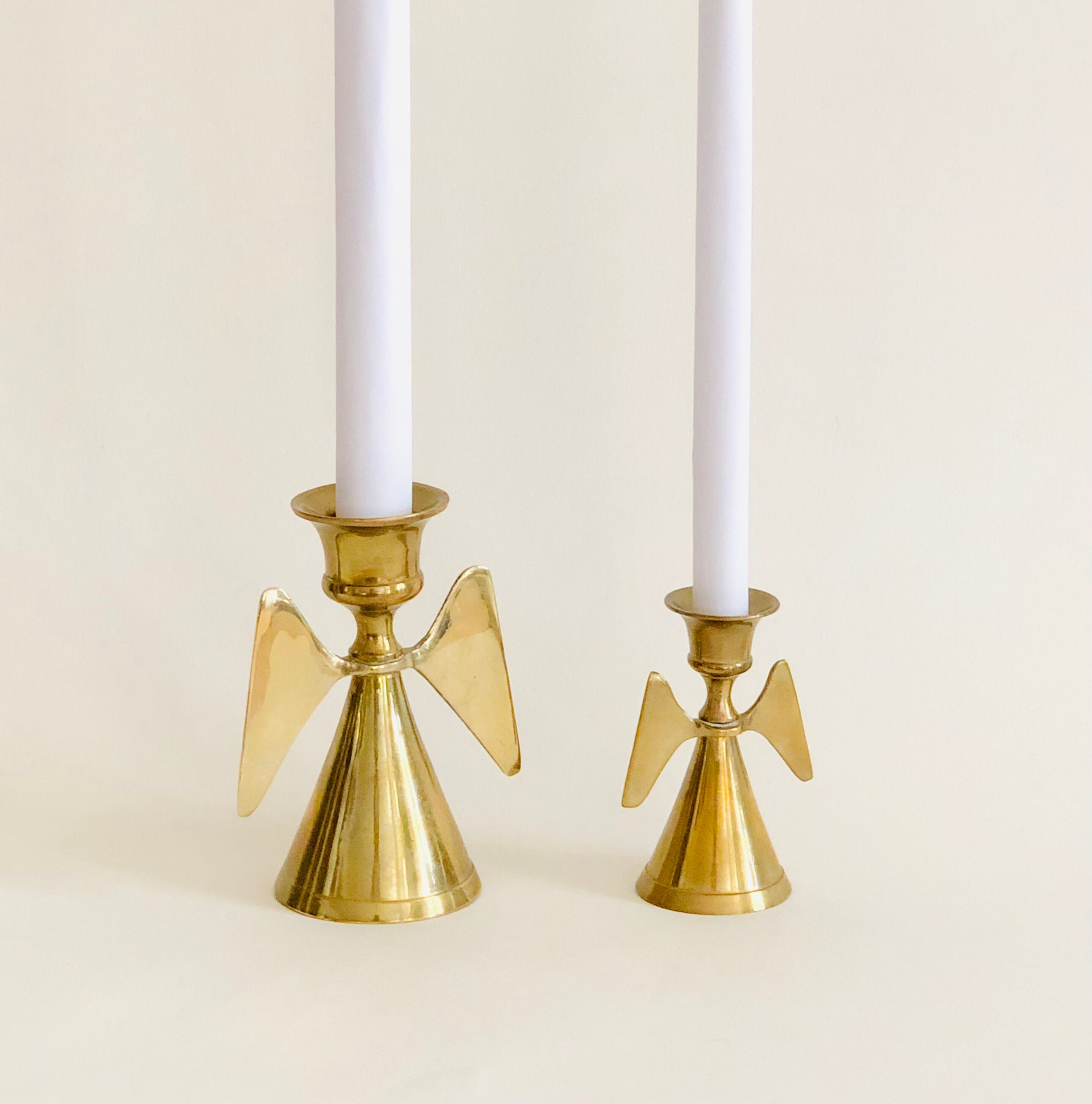 Duo of brass angel candle holders