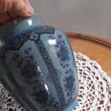 Decorative vase in blue glazed ceramic with floral decoration and arabesques, circa 1930