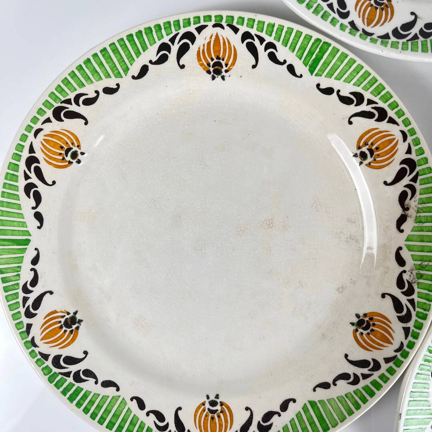 7 assiettes à dessert Sarreguemines "Maroussia", début XXe