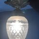 Bronze ceiling lamp and glassware