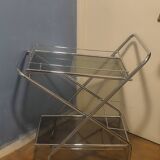Chrome-plated metal serving trolley