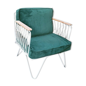 Wrought iron cross armchair with green velvet cushions