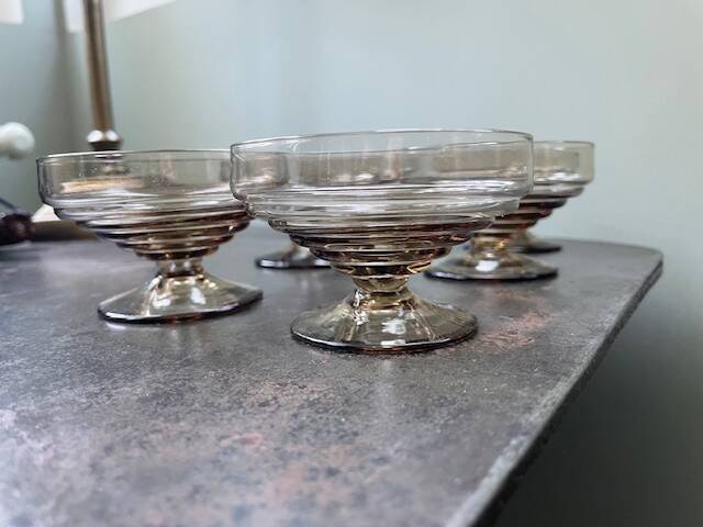 6 vintage glass ice cream or fruit cups or trou normand in blown brown glass.