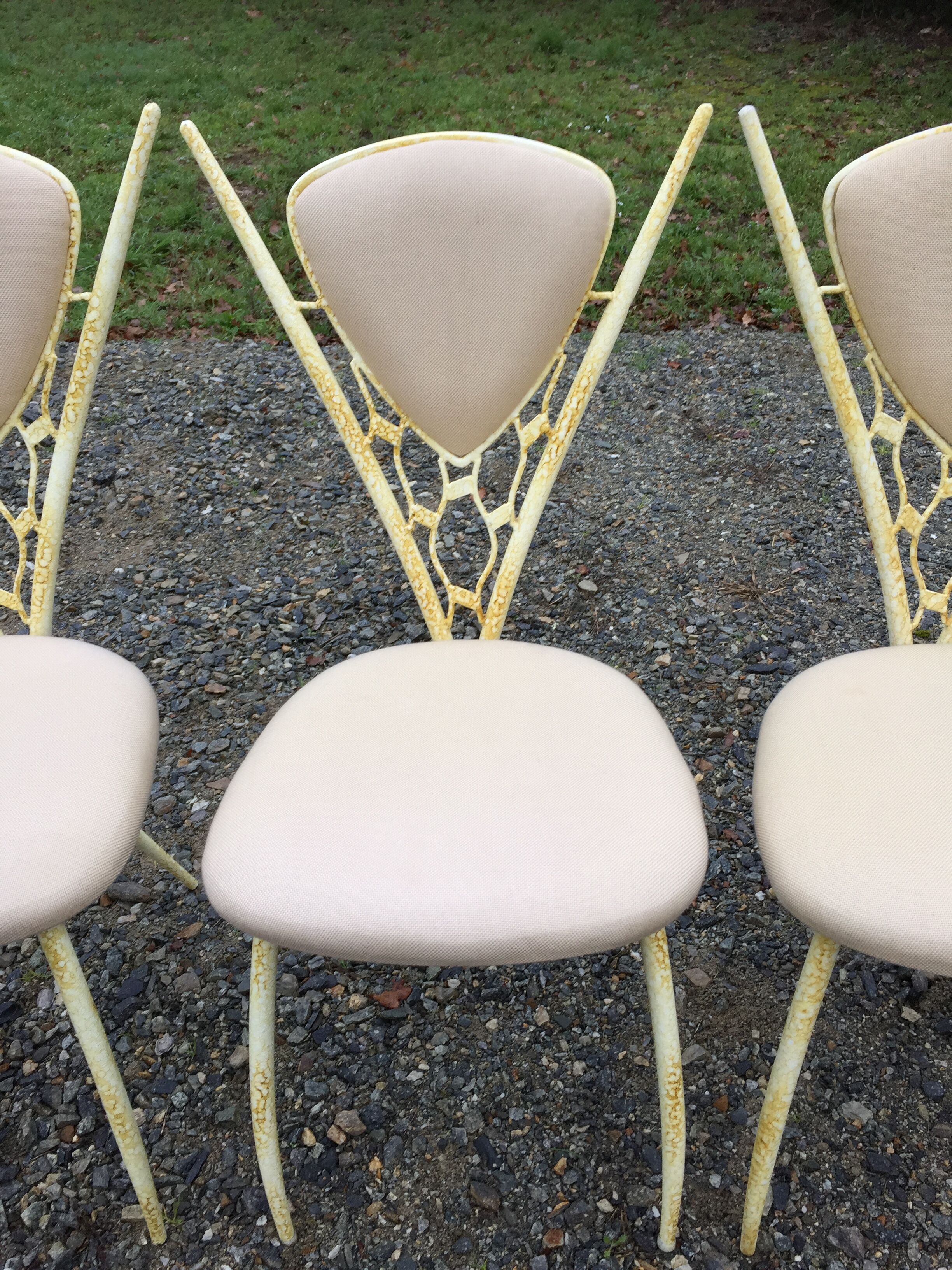 4 vintage chairs in tubular metal lacquered white yellow.