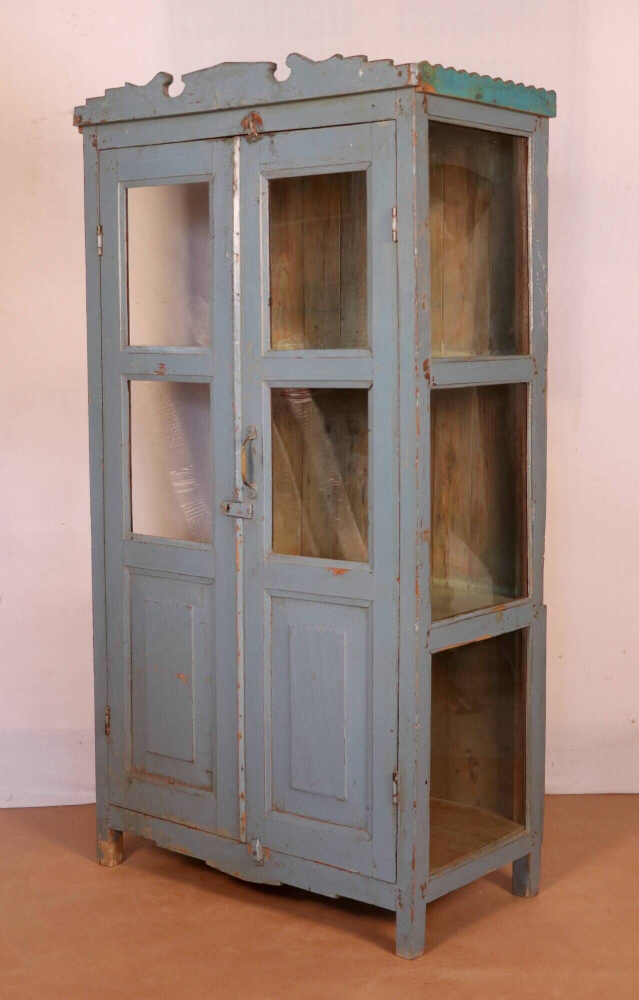 Old art deco display case in original Burmese teak with gray-blue patina