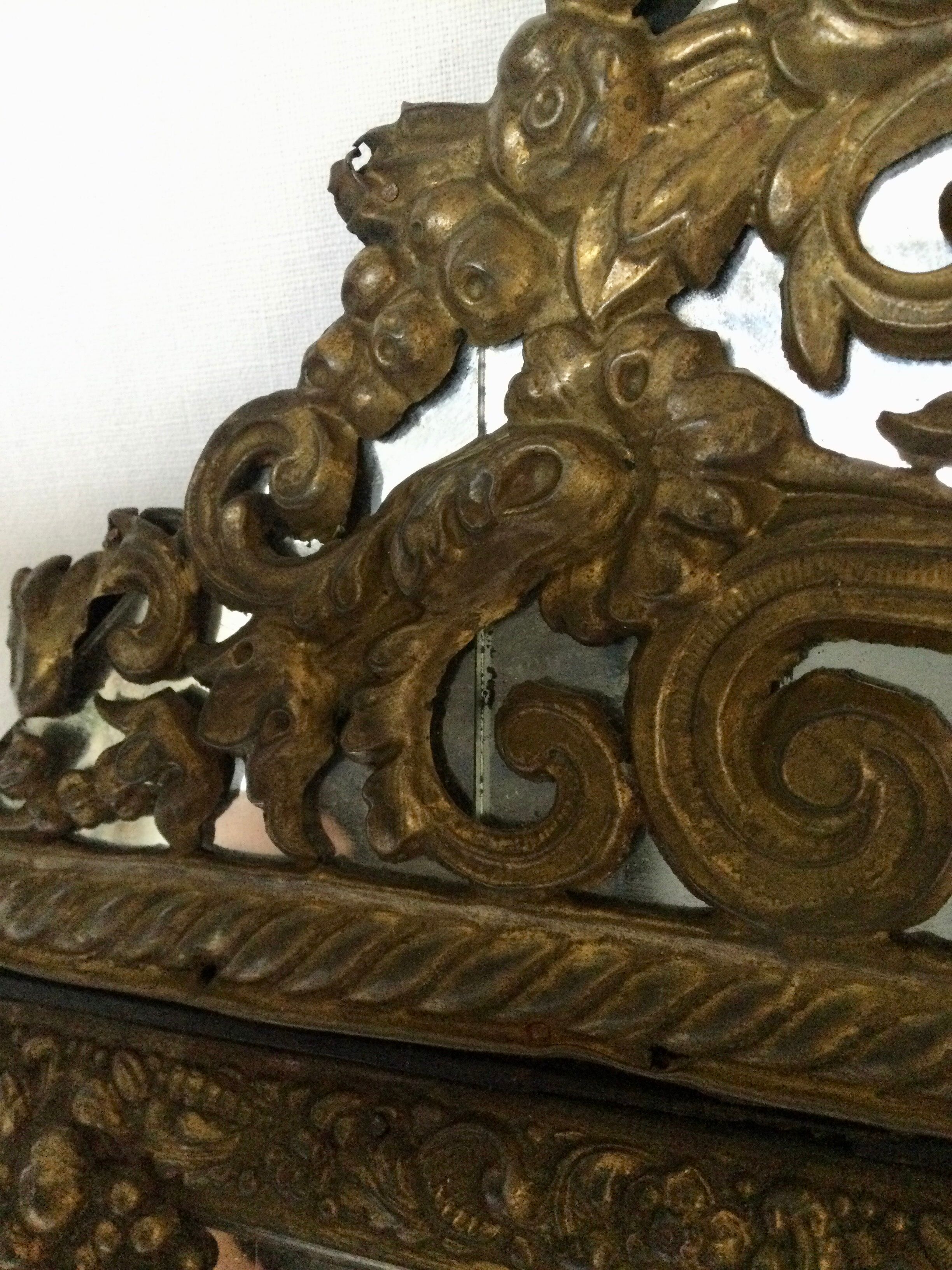 19th century embossed brass mirror with bead - 65x39cm