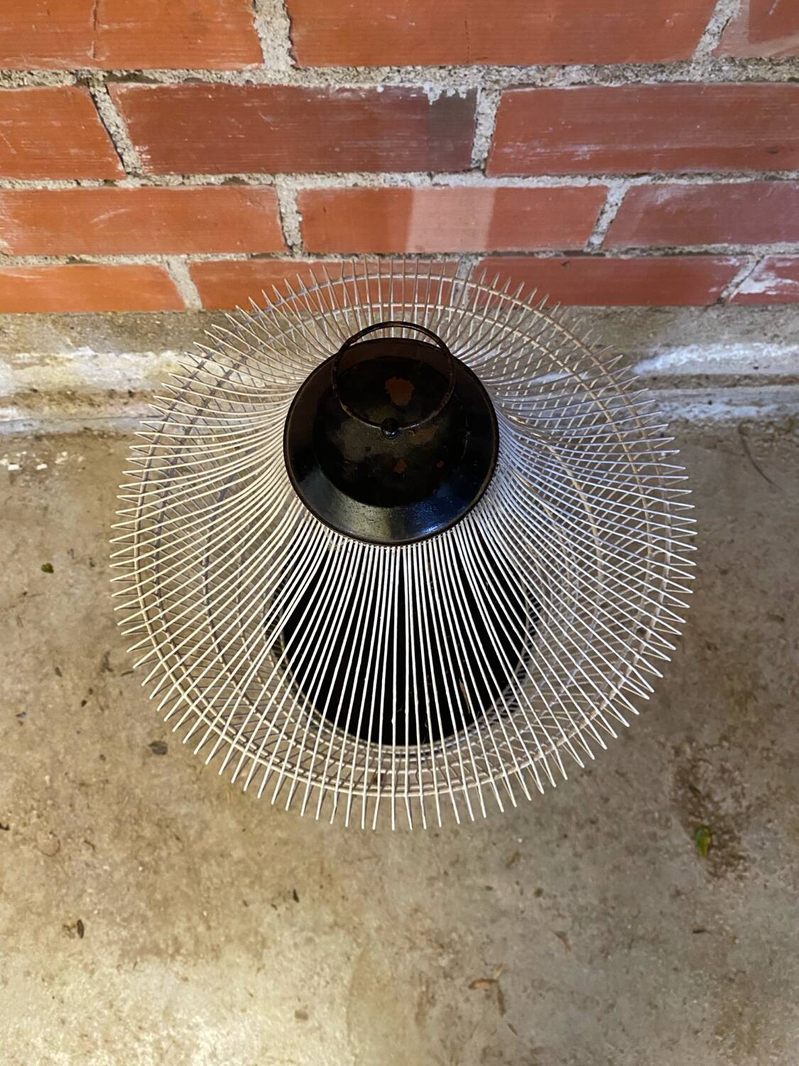 Antique black & white metal bird cage on vintage decorative legs