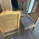 Four antique chairs in classic style with caning and upholstery.