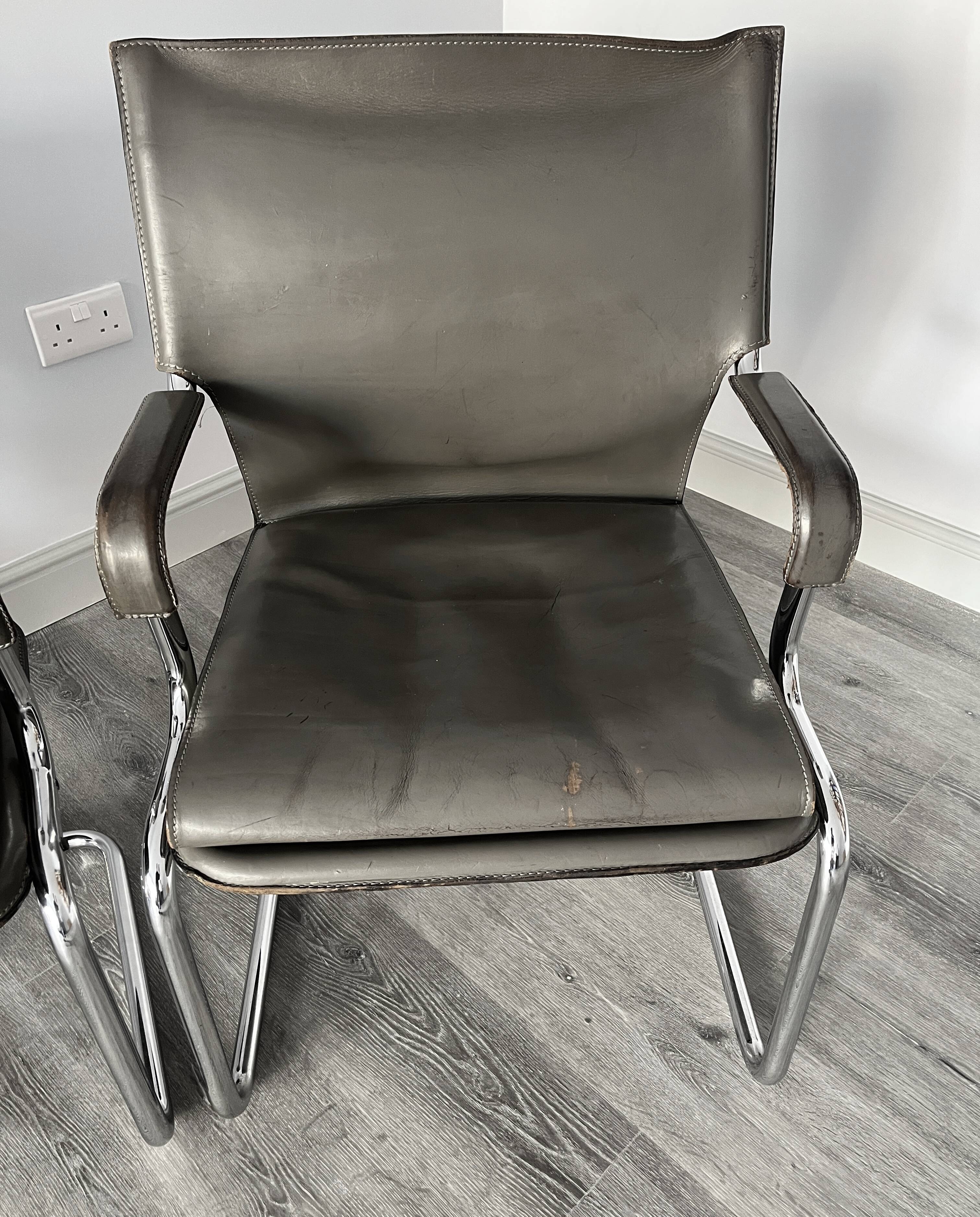 Set of 6 Uno chairs in grey leather on tubular chrome cantilevered frames
